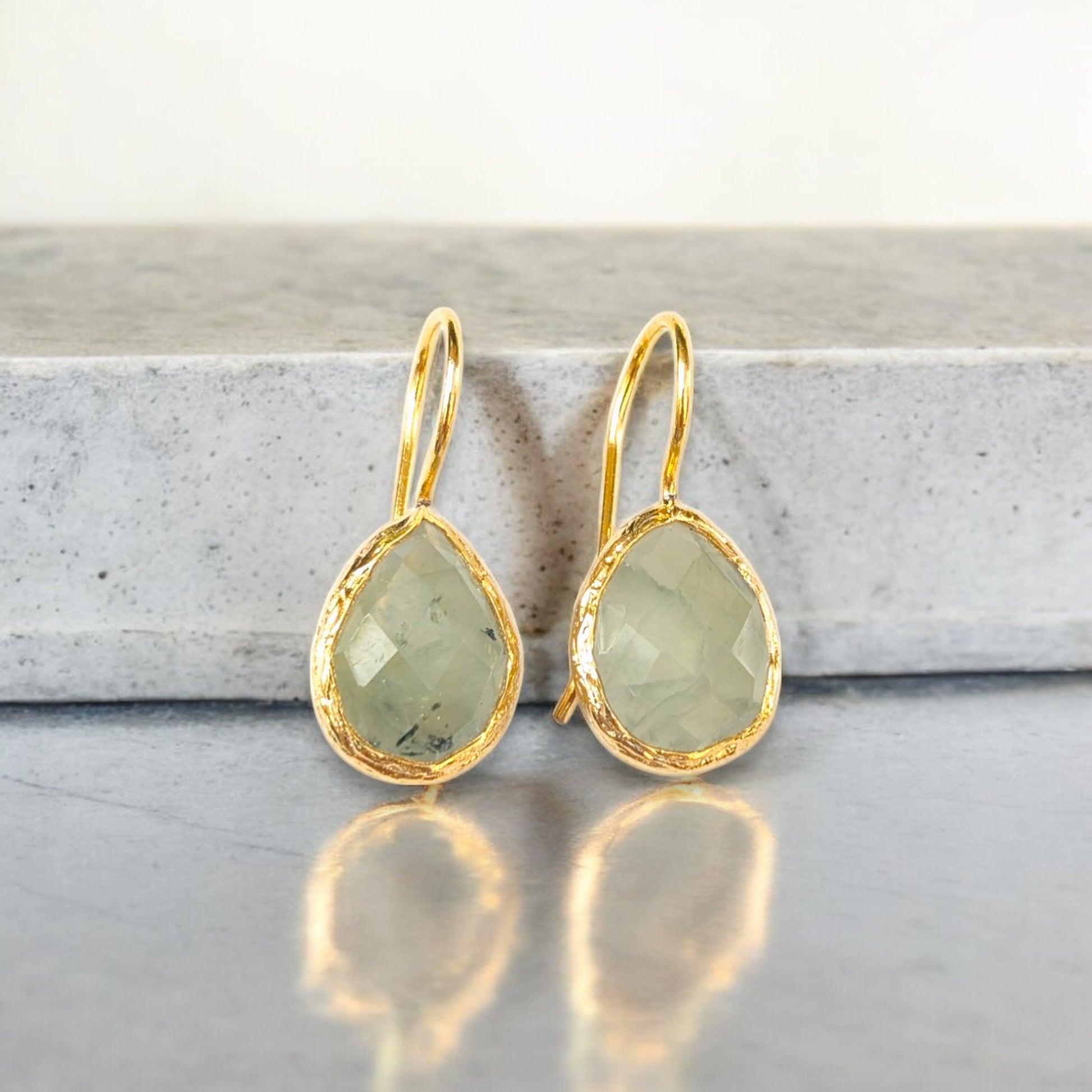 Aventurine teardrop drop earrings with textured gold bezels and simple gold hooks.