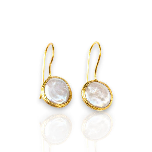 Coin pearl drop earrings with textured gold bezels and iridescent pearls.