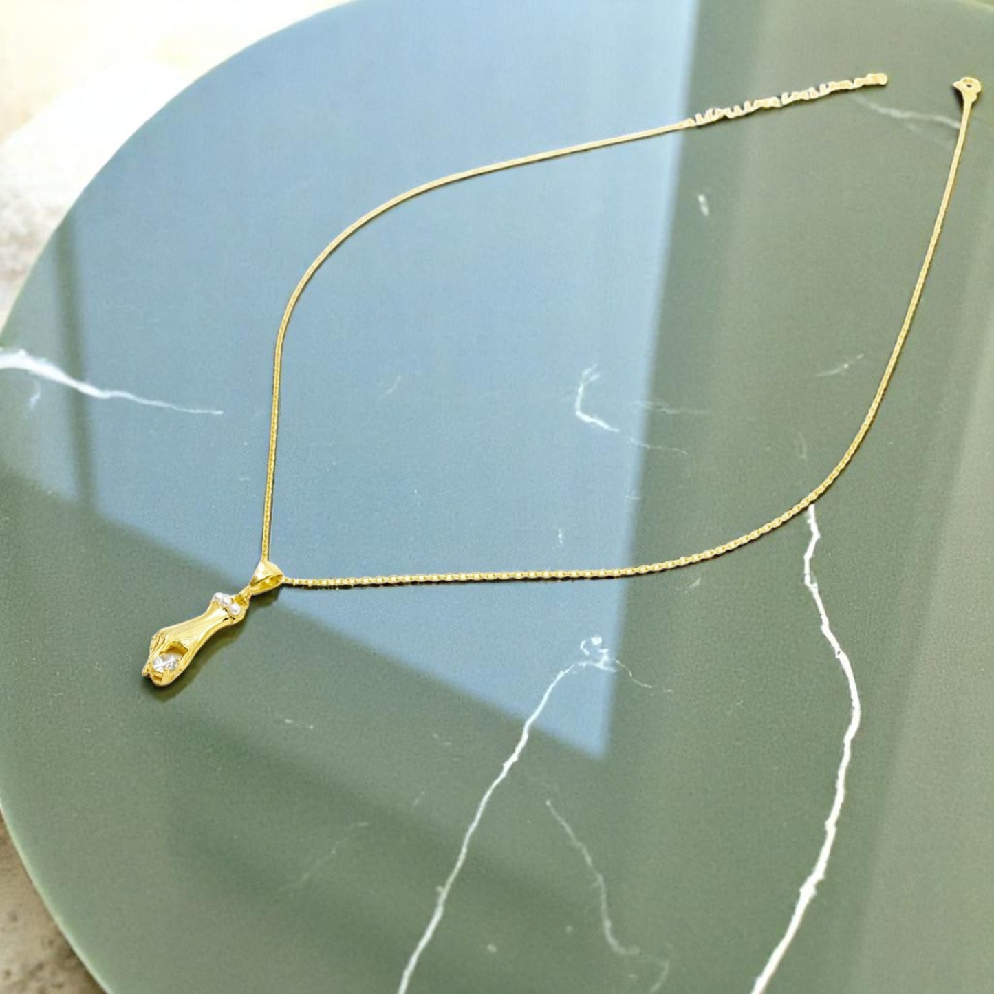 Disembodied Hand Gold Necklace