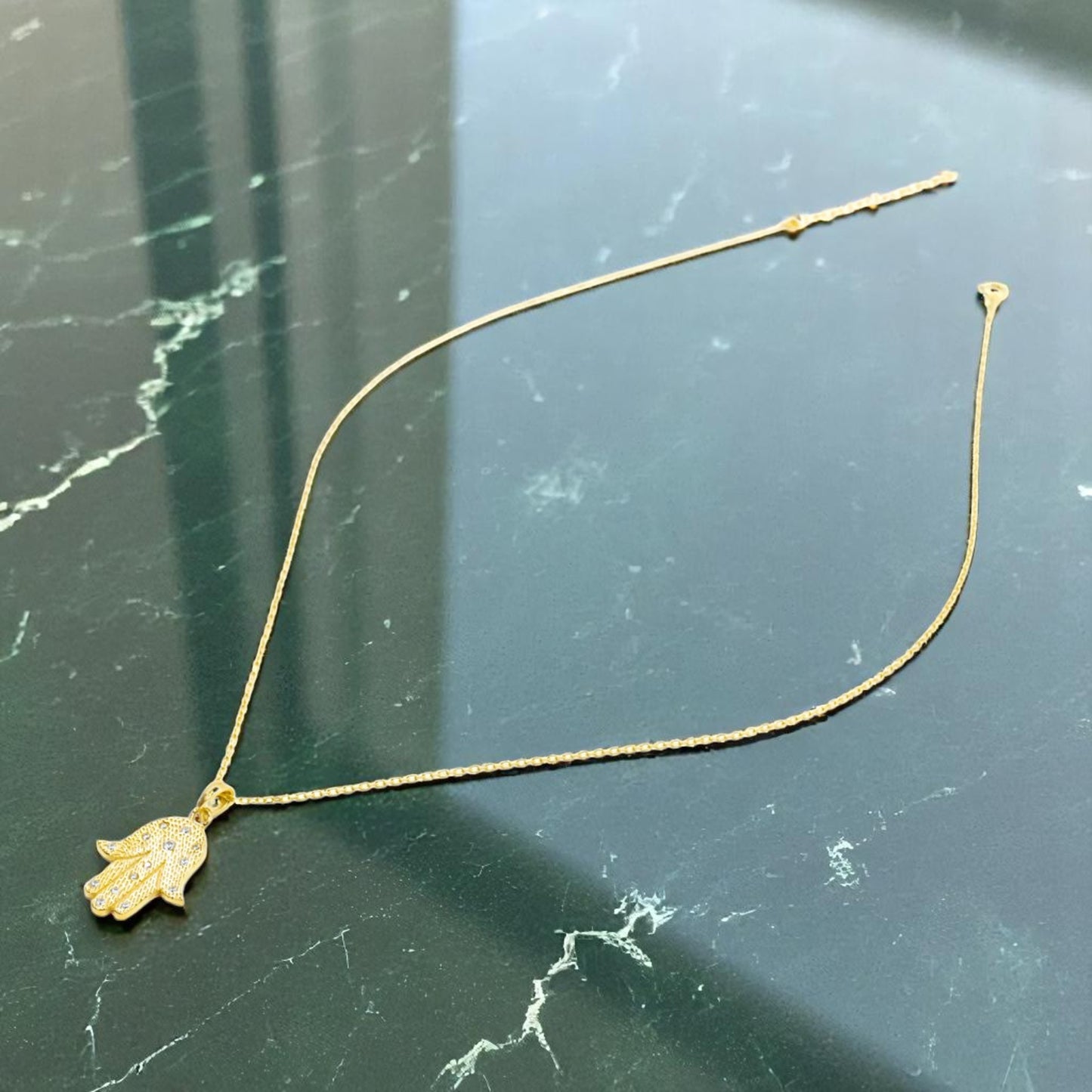 Gold Hamza Necklace with CZ stones