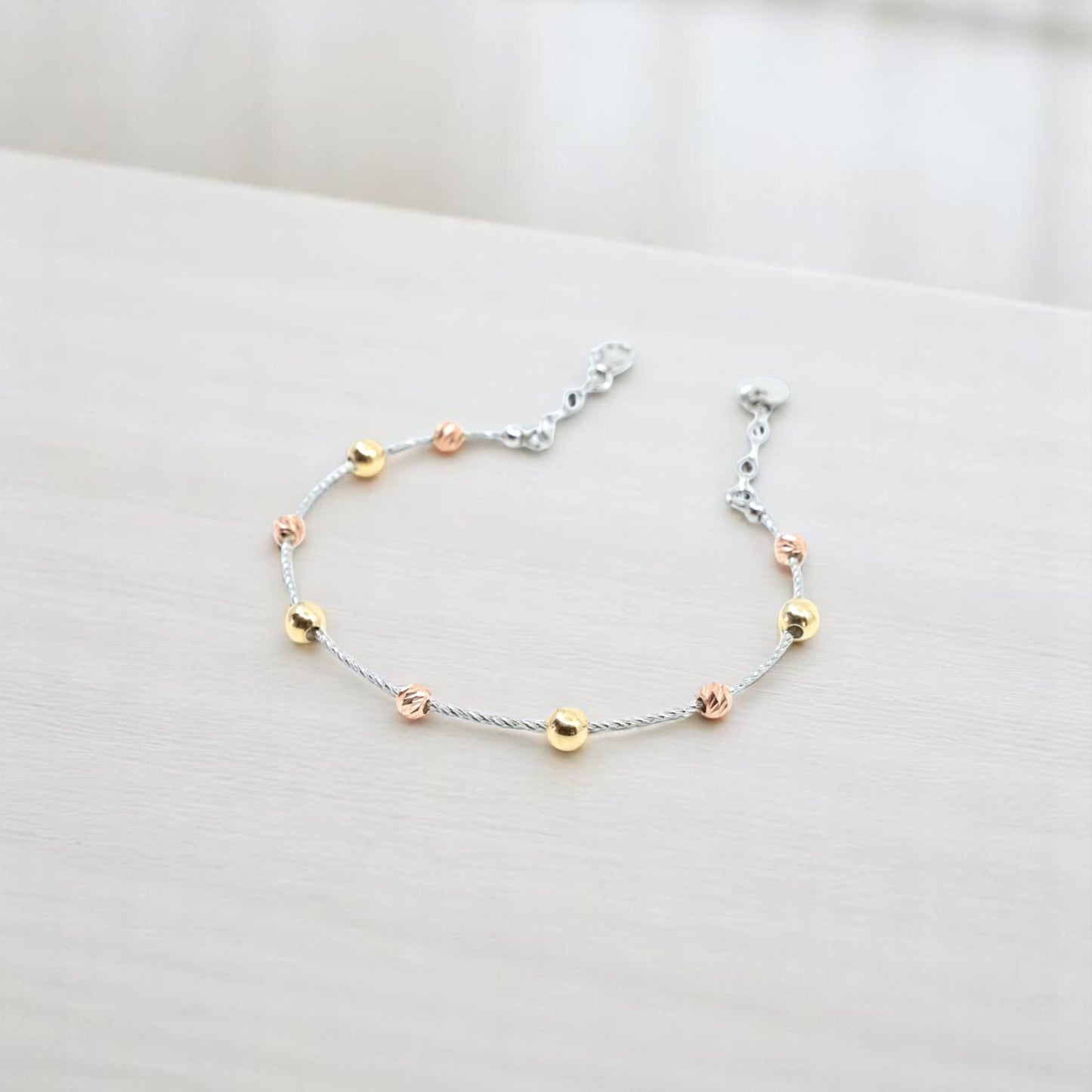 Silver Bracelet with Separated Gold Beads