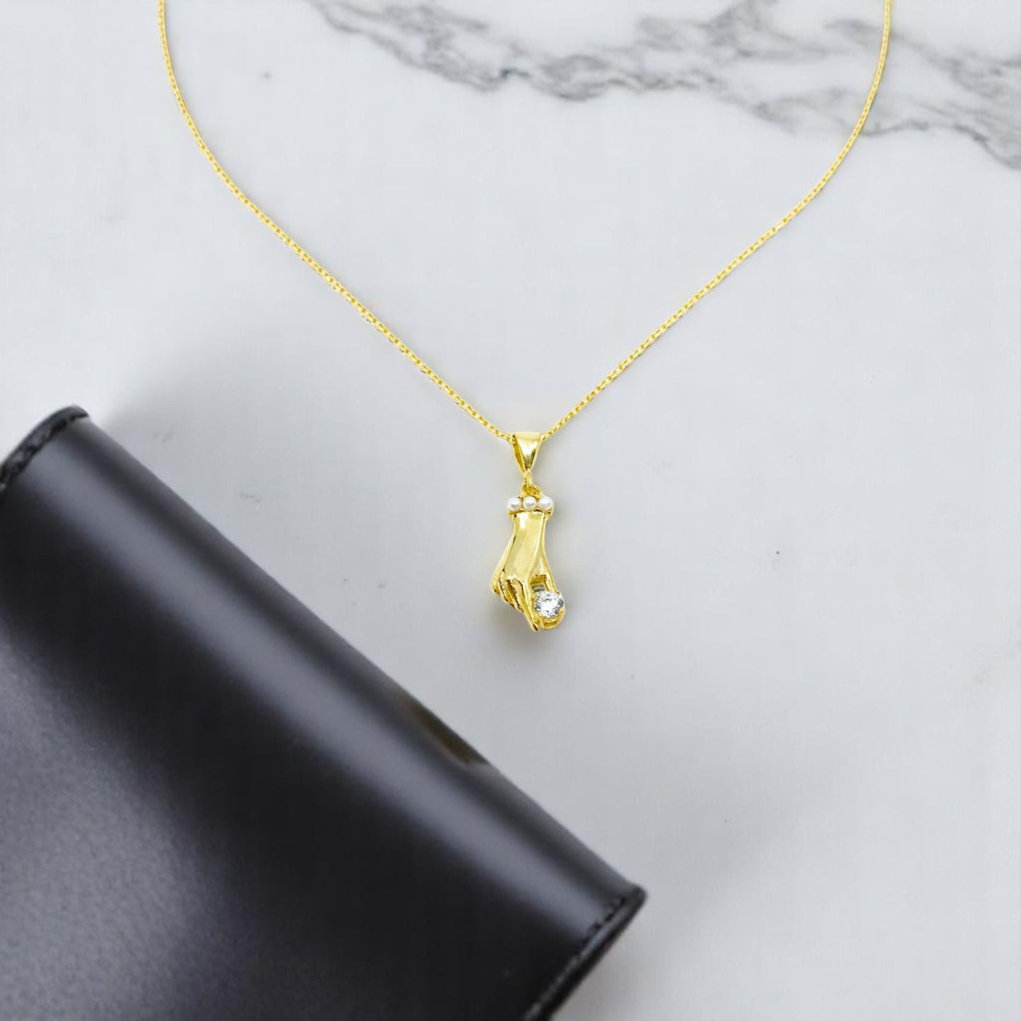 Disembodied Hand Gold Necklace