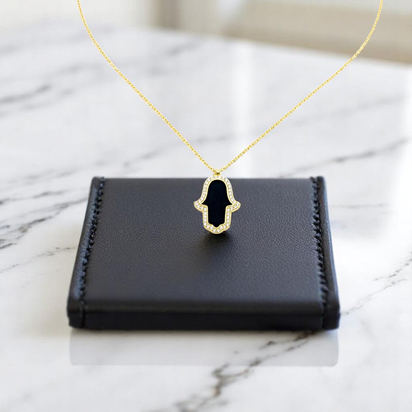 Black Enamel Hamsa Hand with surrounded with CZ Diamond Stones