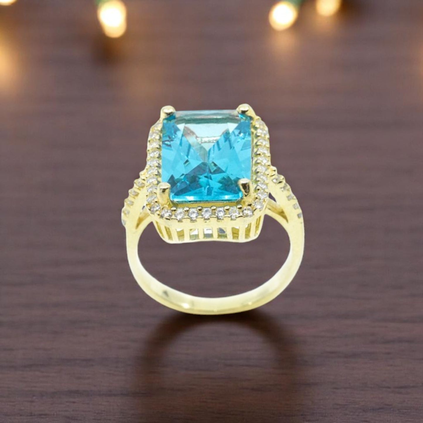 Gold Ring With Light Blue Stone