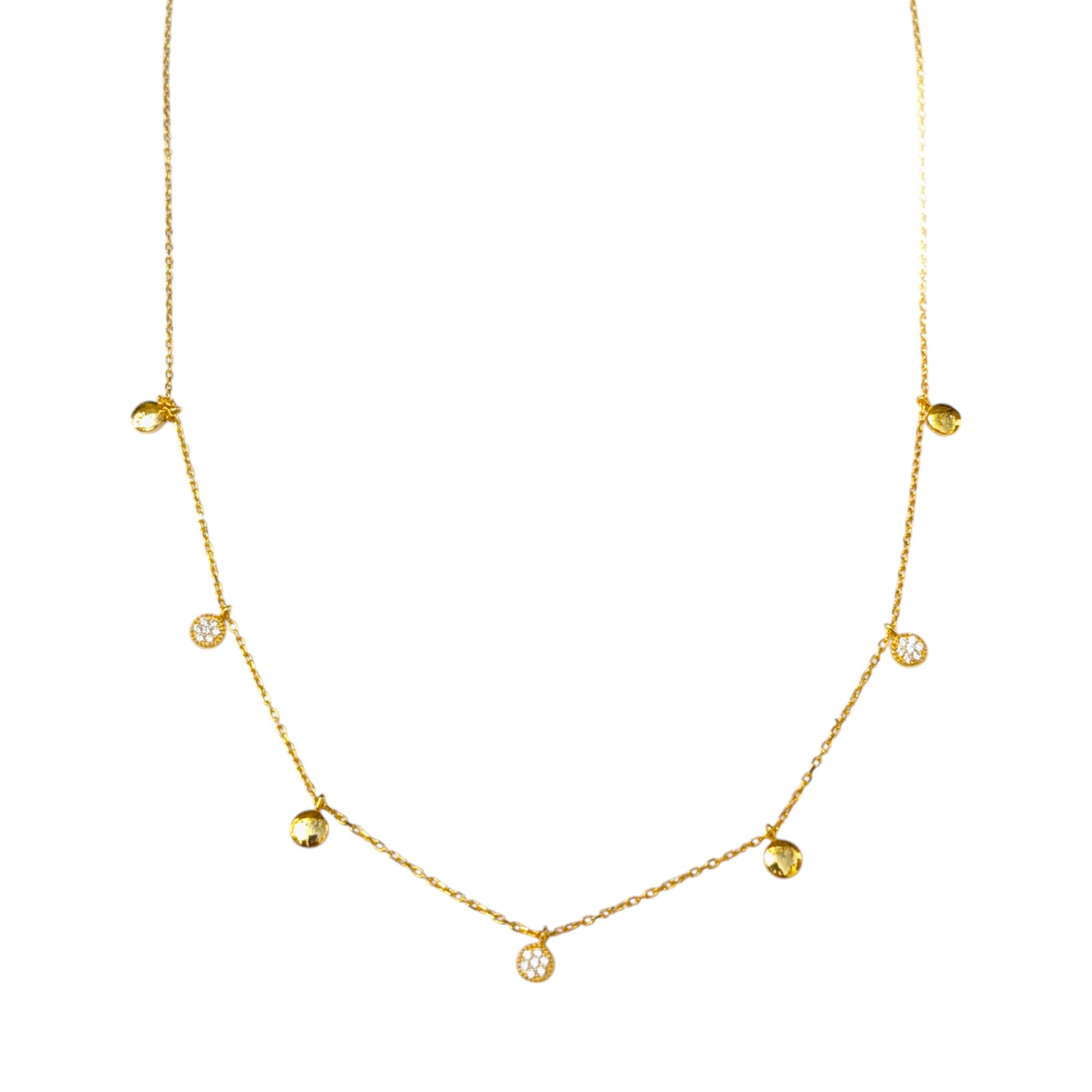 Delicate gold collar necklace with gold discs and clear stone charms