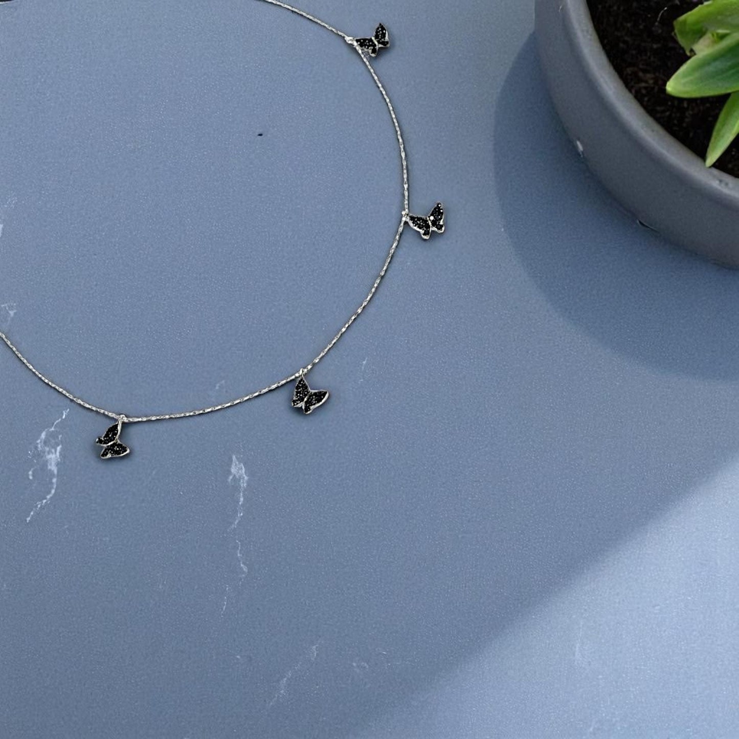 5 BLACK BUTTERFLY NECKLACE