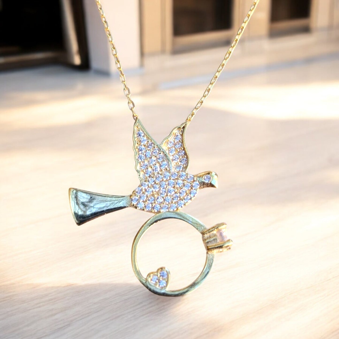 dove necklace with heart ring and cubic zirconia stones