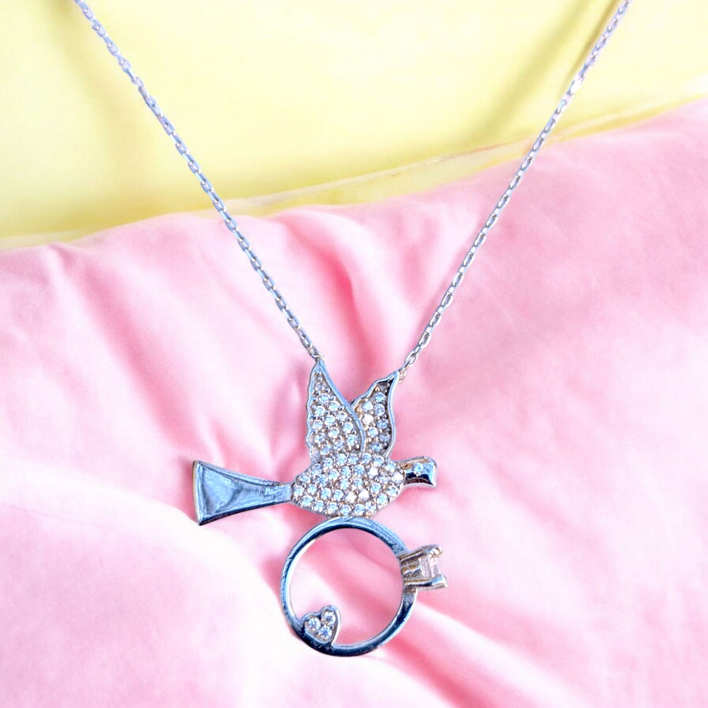dove necklace with heart ring and cubic zirconia stones