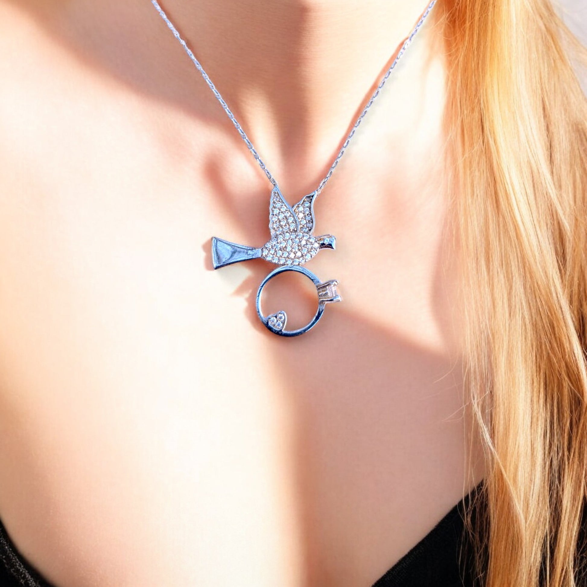 dove necklace with heart ring and cubic zirconia stones