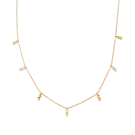 Delicate gold necklace with bezel-set CZ accents