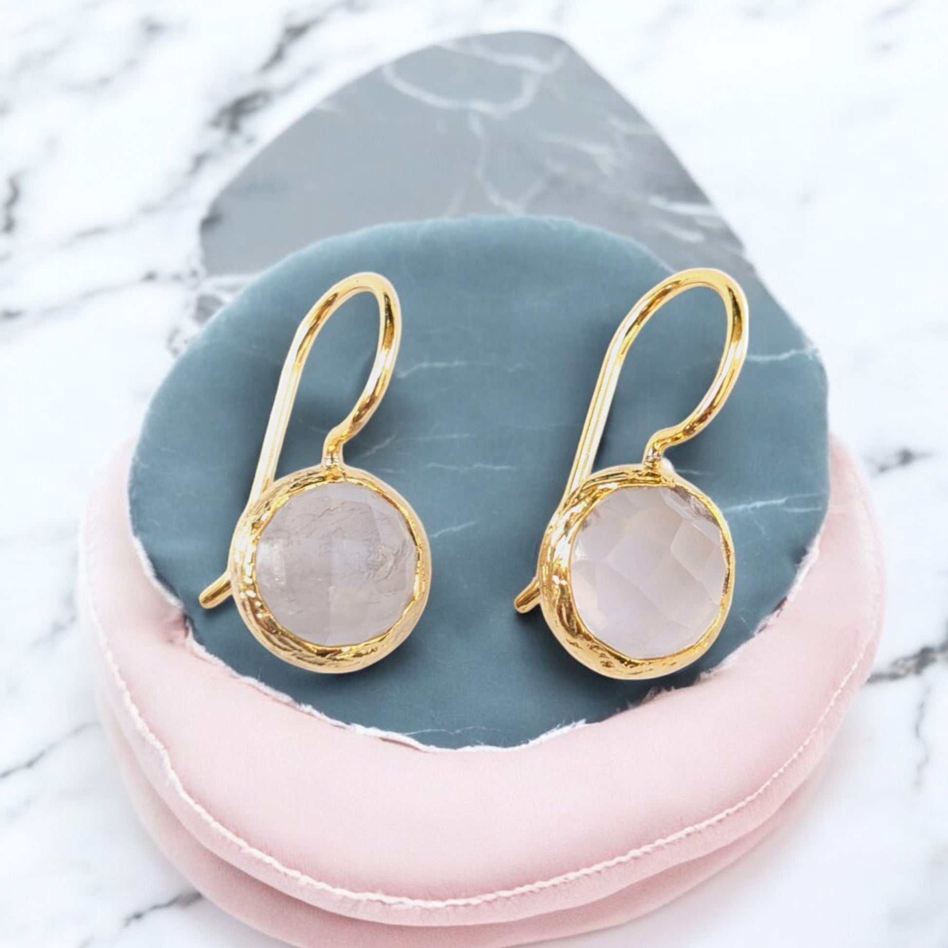 Moonstone drop earrings with textured gold bezels and faceted moonstones