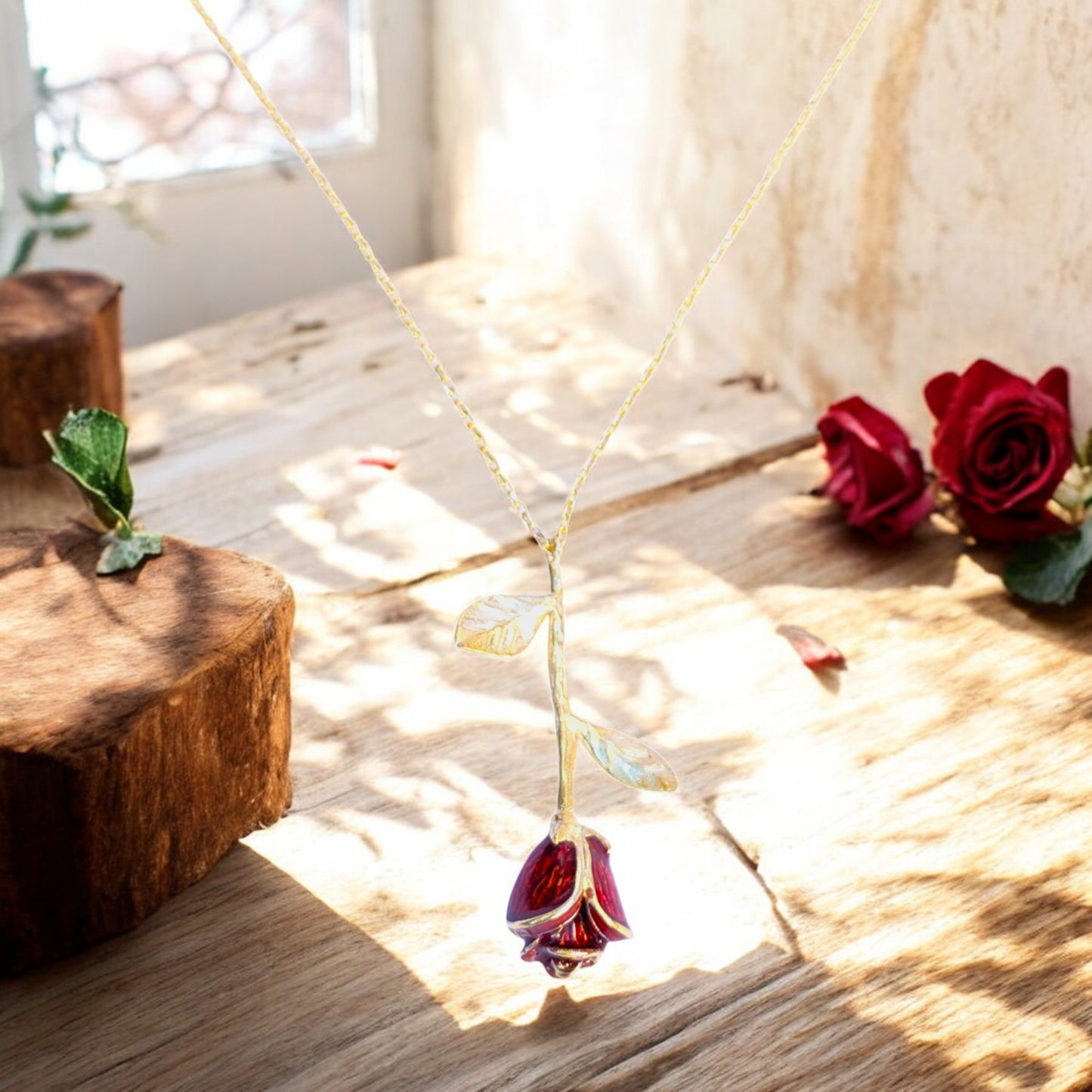 Delicate rose pendant necklace with red enamel bloom and silver chain