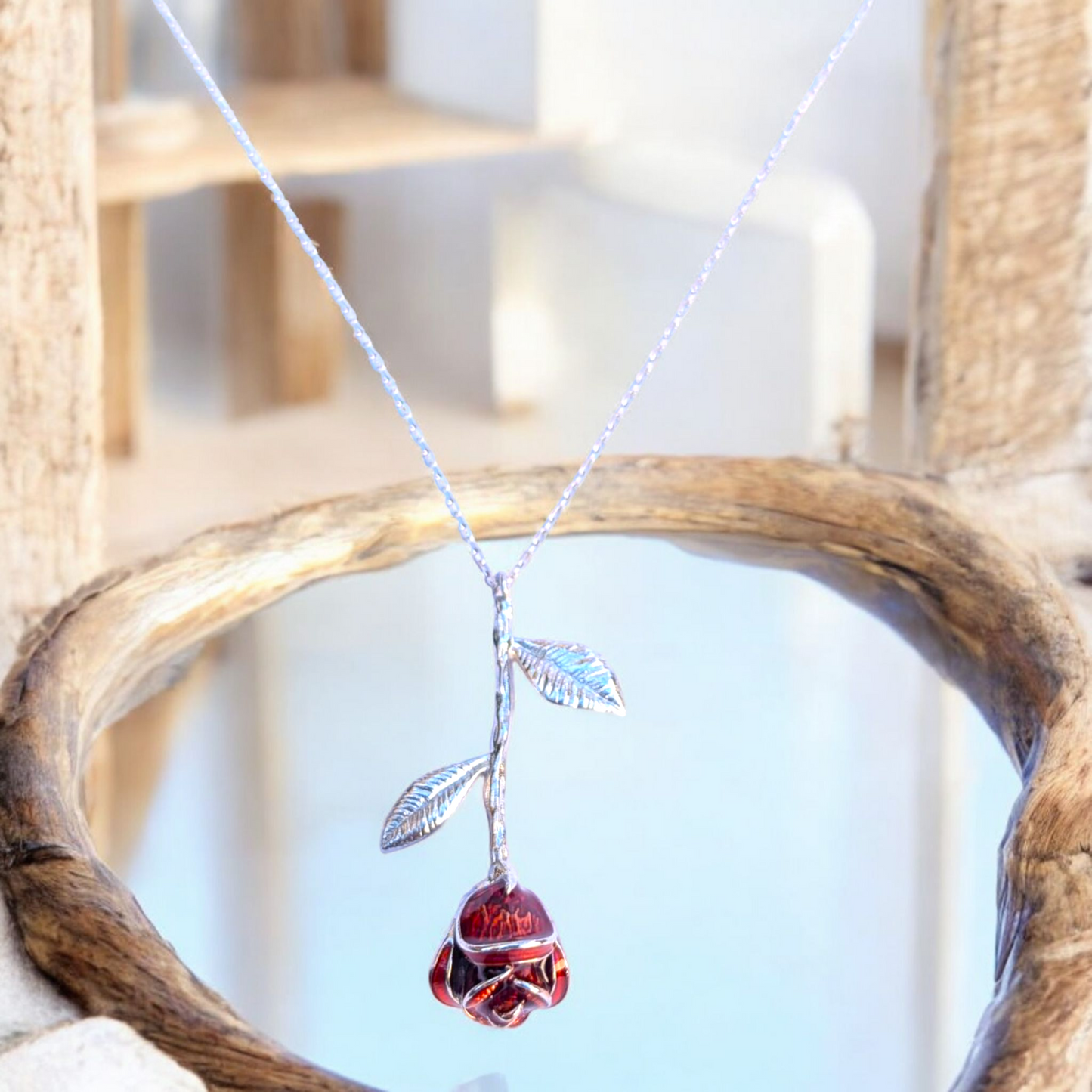 Delicate rose pendant necklace with red enamel bloom and silver chain