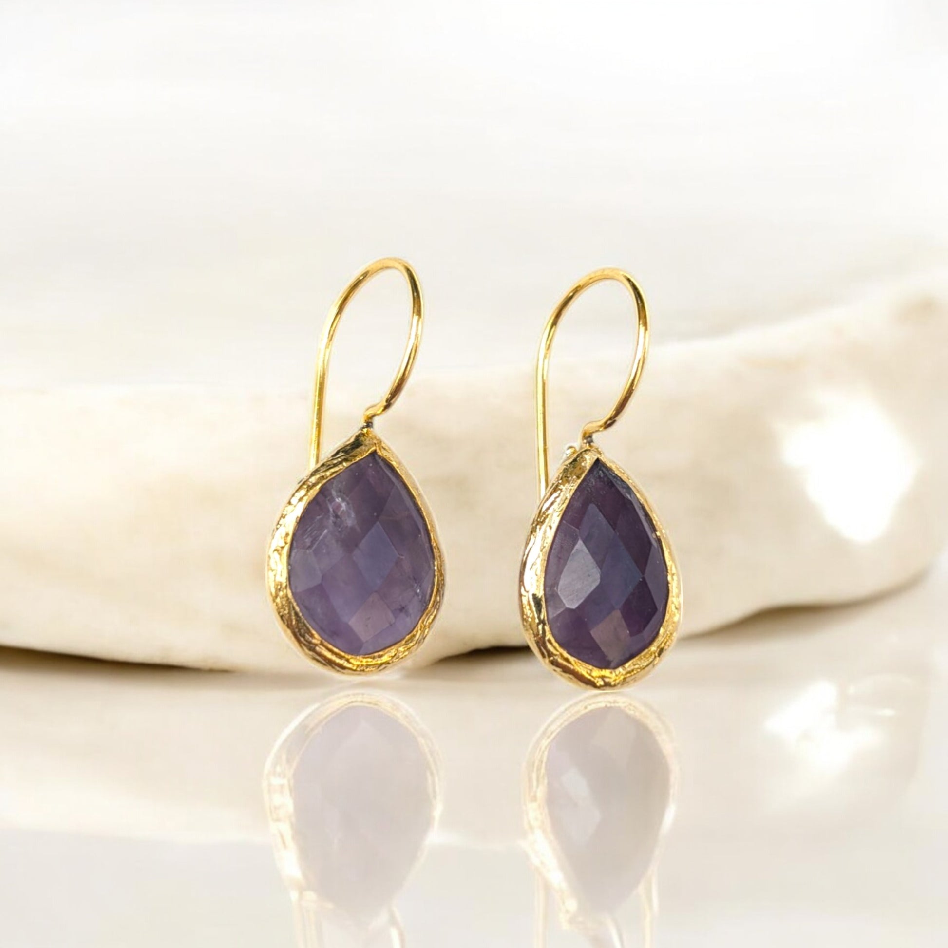Teardrop amethyst bezel  earrings with gold-plated trim