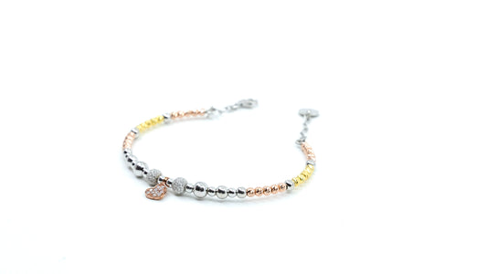 Heart bracelet with gold and silver beads