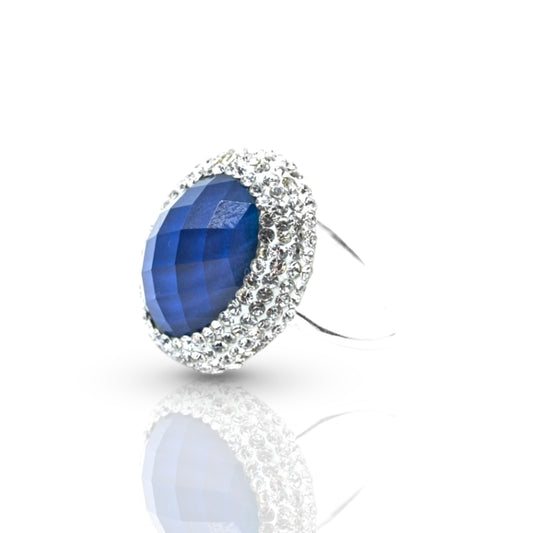 Emerald cut blue stone ring