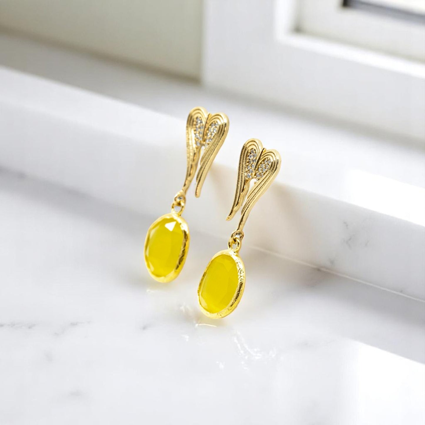 Dangling Heart Earring with Yellow Oval Stone