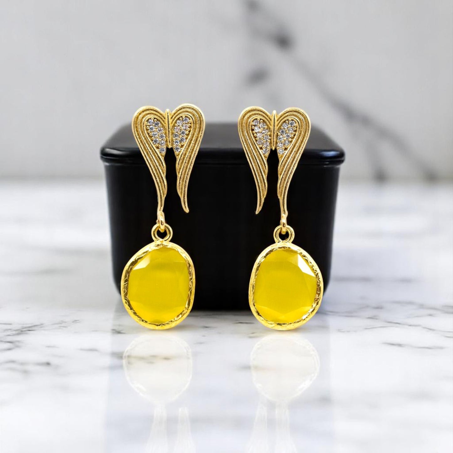 Dangling Heart Earring with Yellow Oval Stone