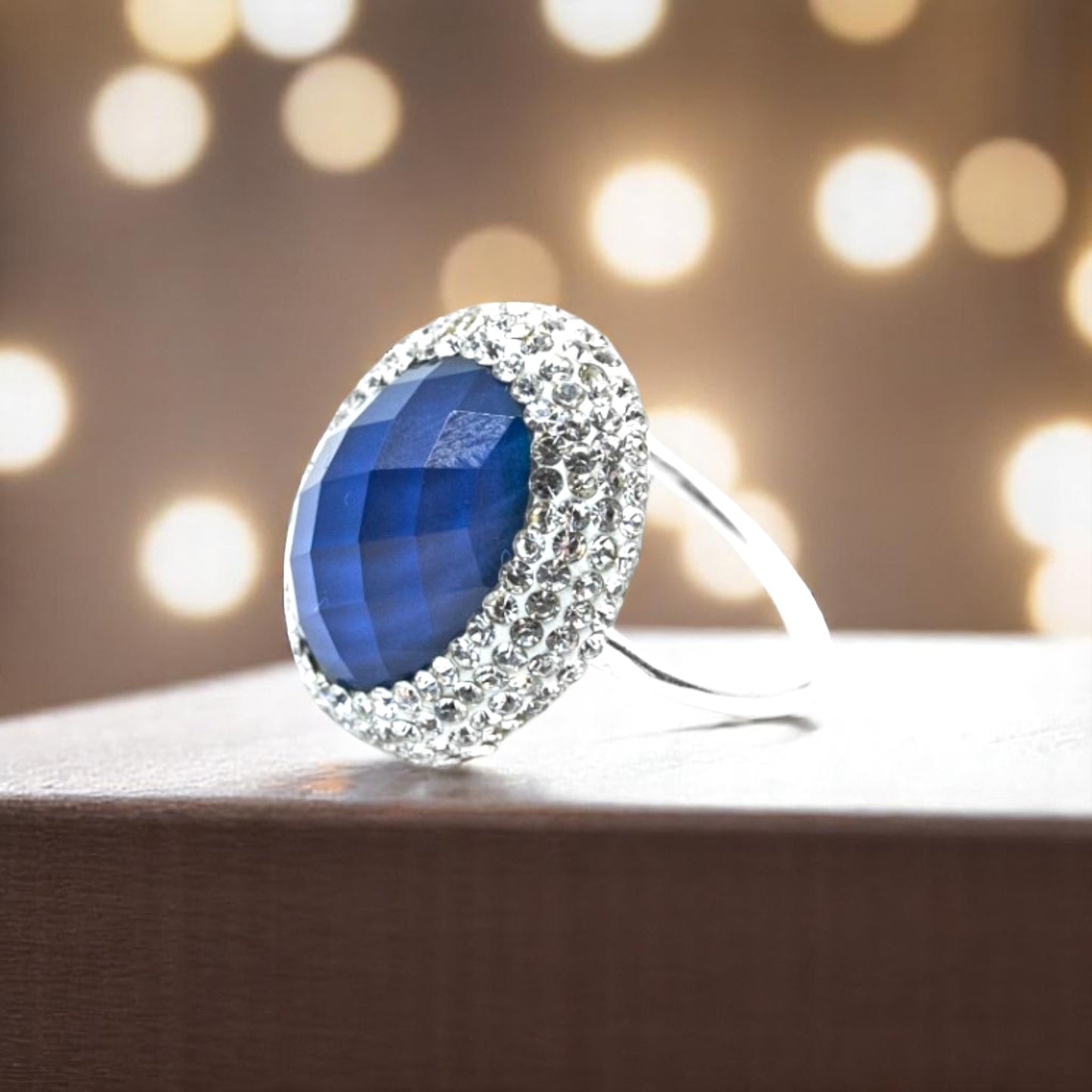 Emerald cut blue stone ring