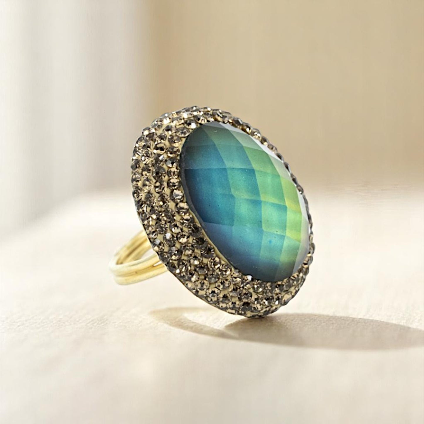 Round Diaspore Color Changing Ring With Hematite Trim