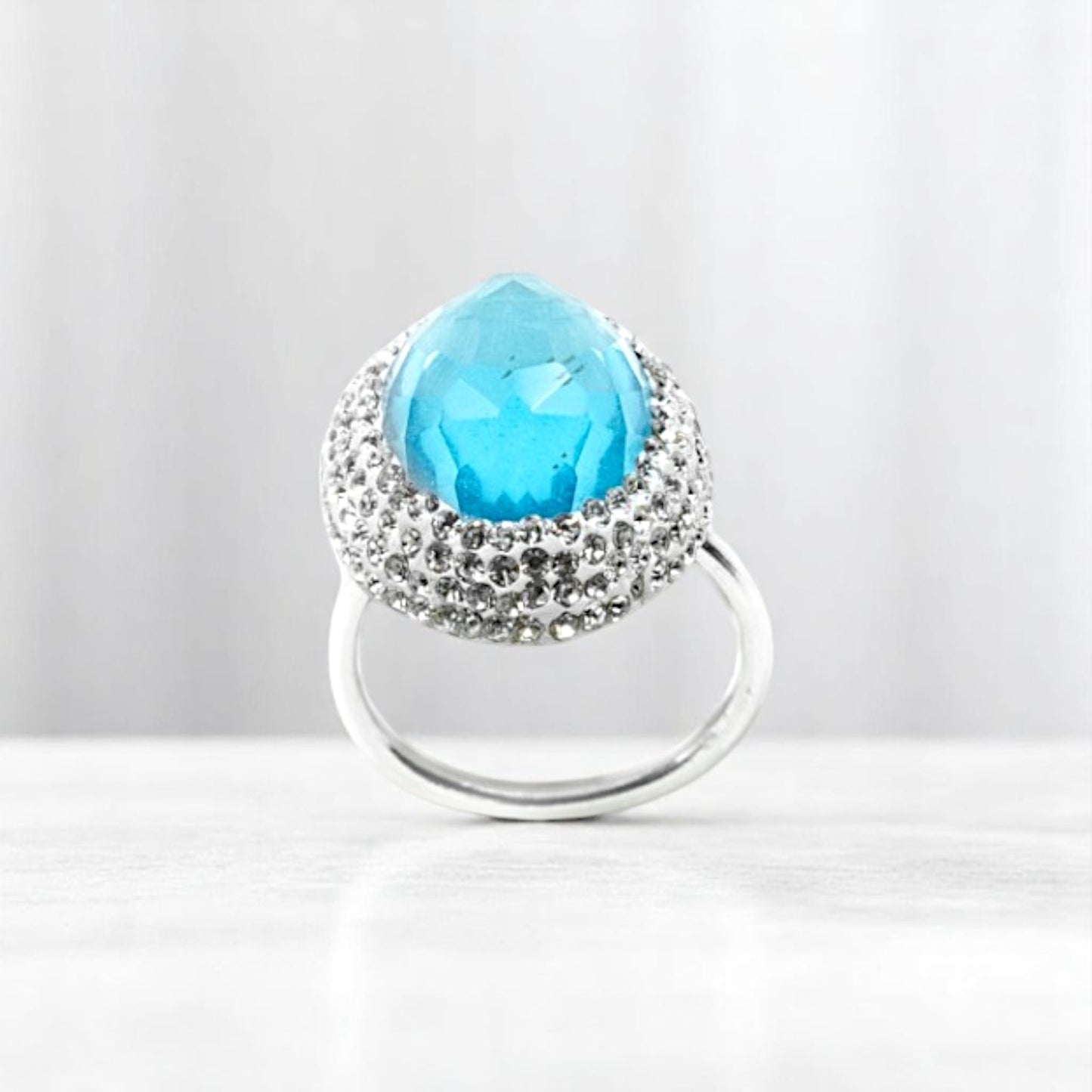 Round Baby Blue Stone Ring with Hematite Trim