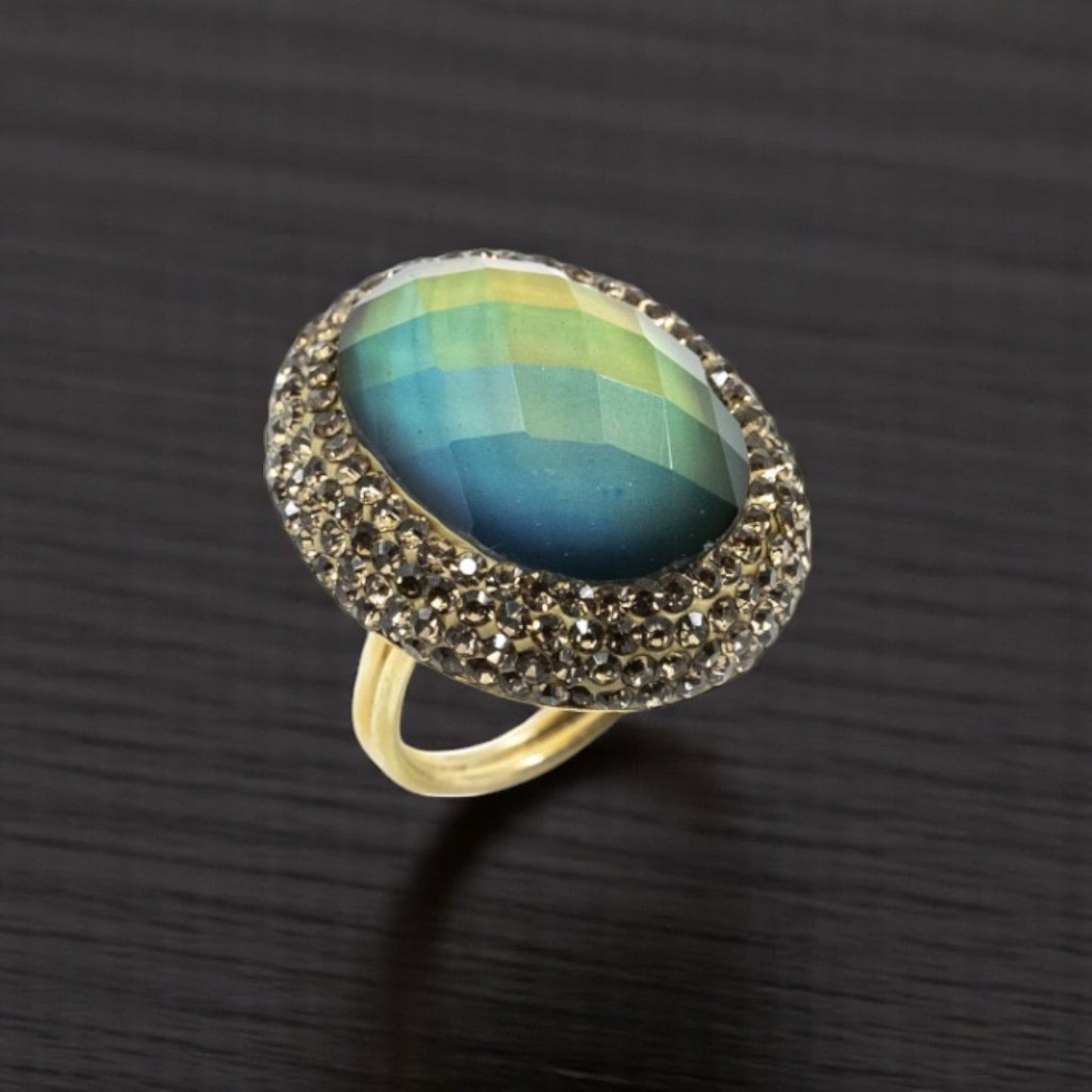 Round Diaspore Color Changing Ring With Hematite Trim
